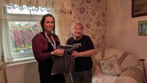 Beneficiary receiving a warm pack